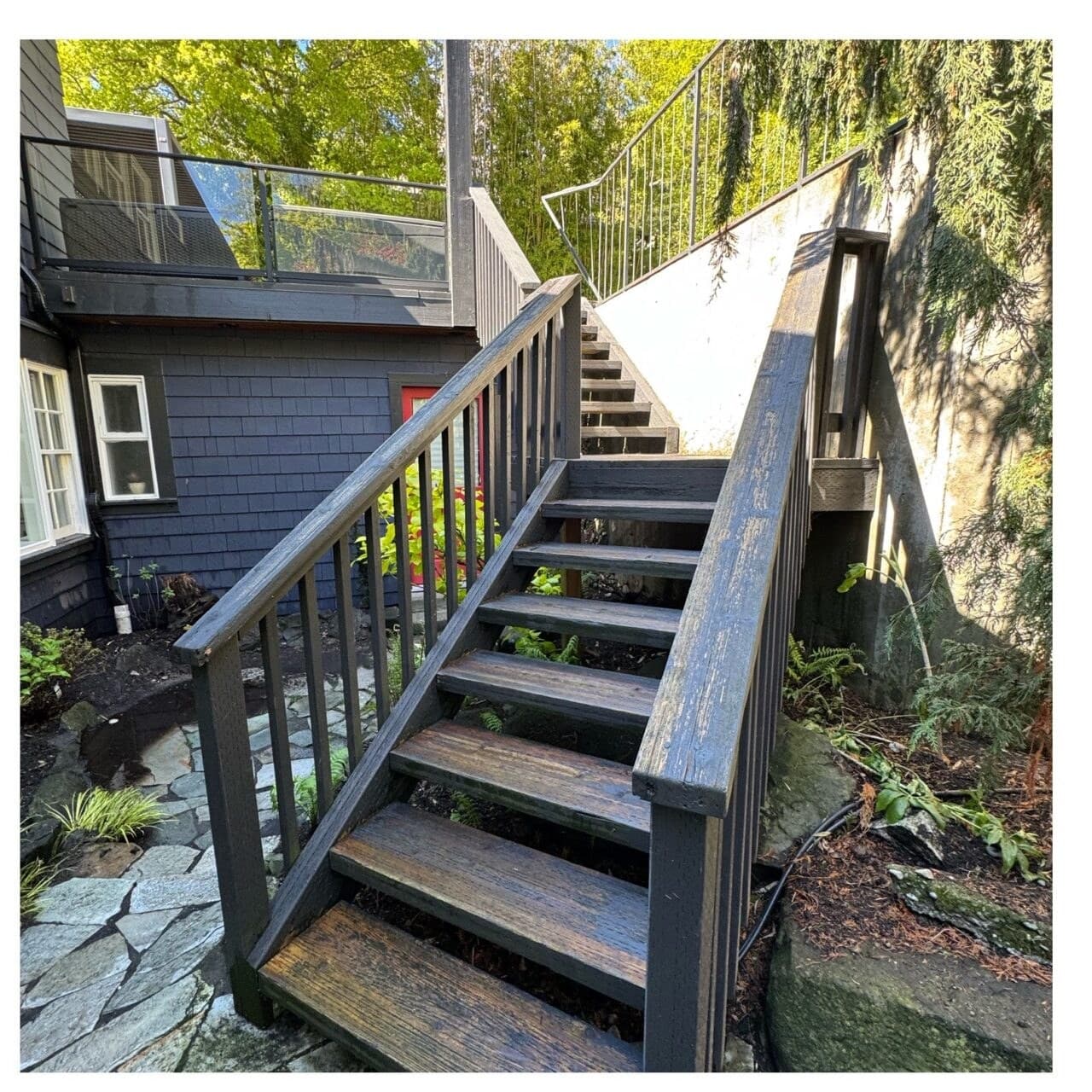 Wooden stairs cleaned to a dark stained finish